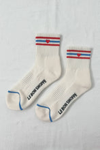 Load image into Gallery viewer, Pair of white socks with red, blue, and white stripes on a light gray background
