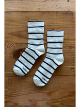 Load image into Gallery viewer, Pair of striped socks on a wooden floor
