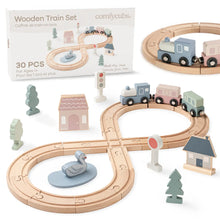 Load image into Gallery viewer, Wooden train set with tracks, trains, and accessories on a white background
