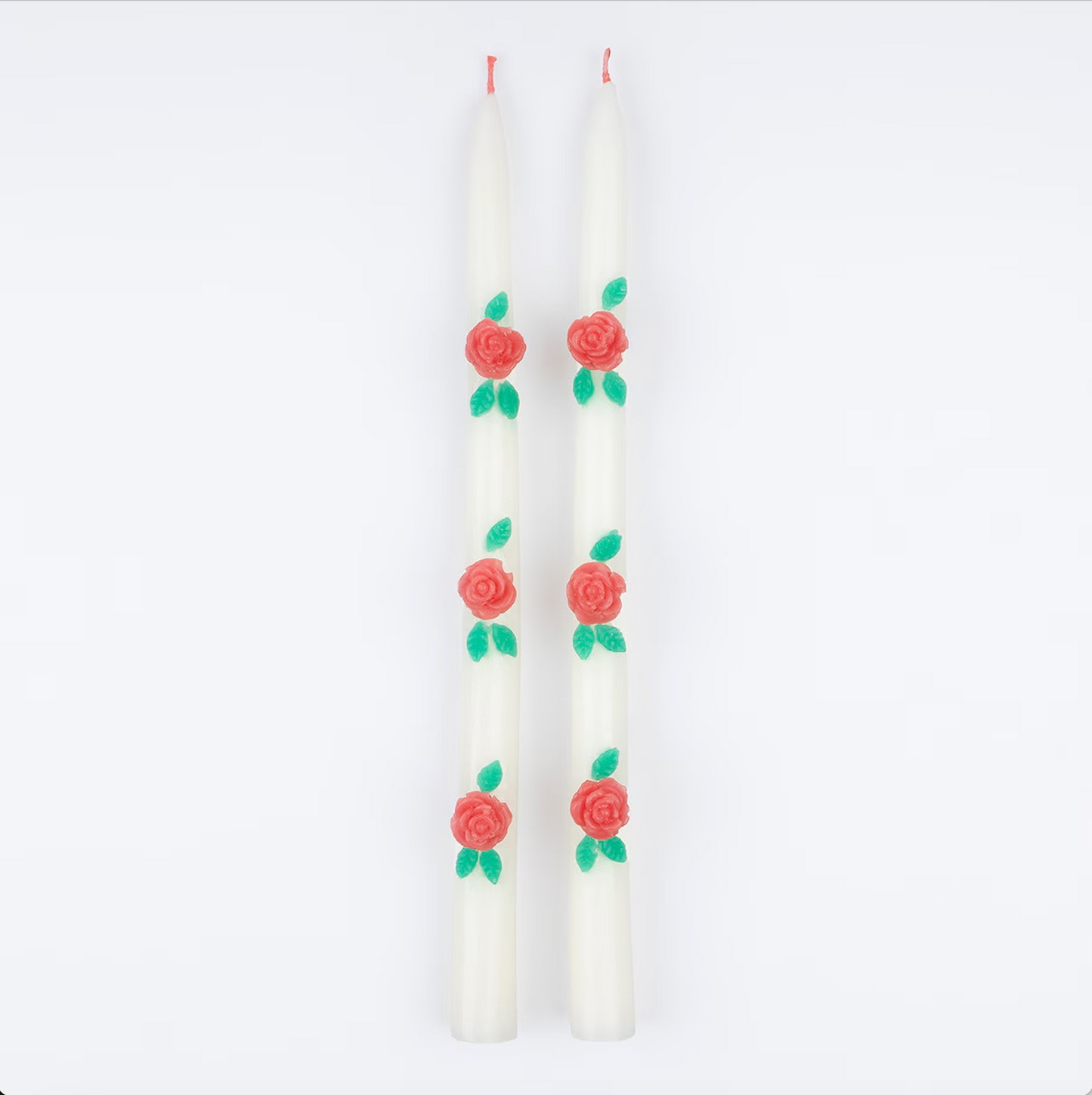 taper candles with roses