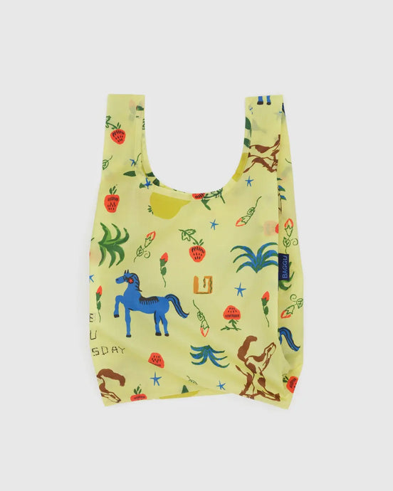 Baggu reusable shopping bag with colorful animal western patterns on a light yellow background