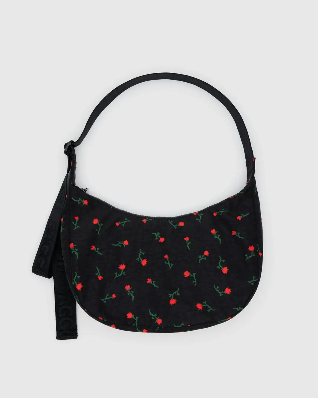 Baggu black handbag with red floral pattern on a light gray background