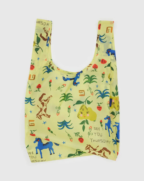 Baggu reusable bag with colorful animal and plant western pattern on a light green background